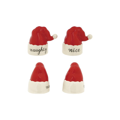 Hand-Painted Stoneware Santa Hat Salt and Pepper Shakers, Two glossy red Santa hat shakers with white pom-poms and white brims, one lettered naughty and the other nice.