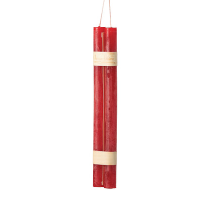 Hanging Timber Taper Candles 12 Inch, Pair, Two amber colored taper candles bound together with cream paper bands hang side by side against a plain white background.