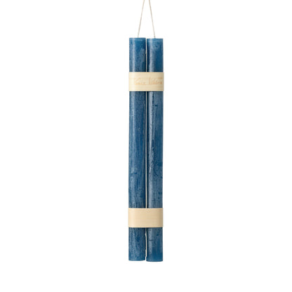 Hanging Timber Taper Candles 12 Inch, Pair, Two amber colored taper candles bound together with cream paper bands hang side by side against a plain white background.