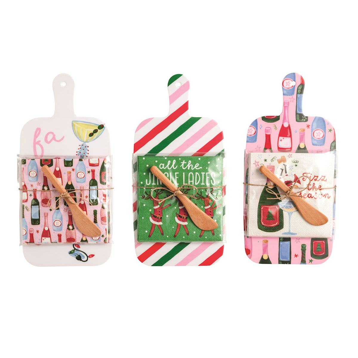 Holiday Bar Melamine Board with Napkins and Spreader, Three holiday melamine paddle boards, each with a wrapped pack of cocktail napkins and a wooden spreader tied on.