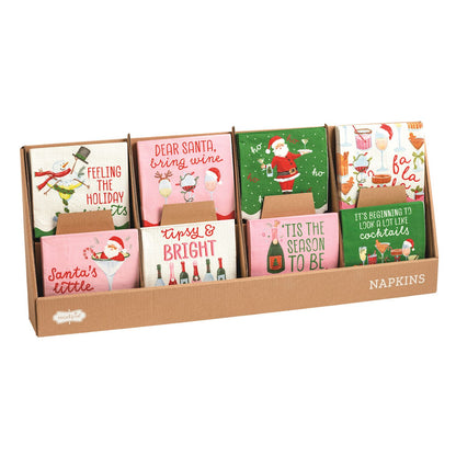 Holiday Bar Paper Cocktail Napkins, Eight square paper cocktail napkins with holiday drink sayings and scalloped pink, green and red borders.