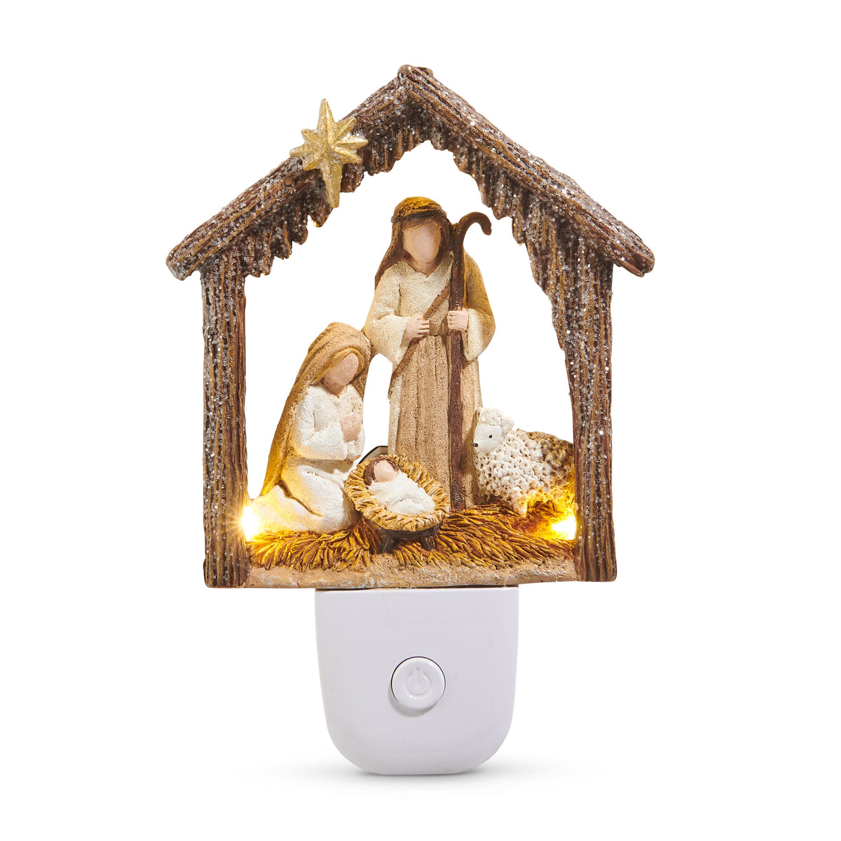 Holy Night Nativity Stable Night Light, A resin nativity stable night light with a glittered roof and gold star, Joseph holding a staff, Mary kneeling by the manger and a sheep, on a white plug-in base.