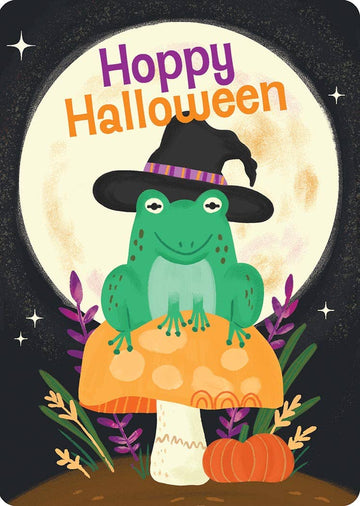 Hoppy Halloween Greeting Card, Front of the card showing a green frog in a black witch hat on a spotted orange toadstool in front of a full moon, with the words Hoppy Halloween above and a pumpkin below.