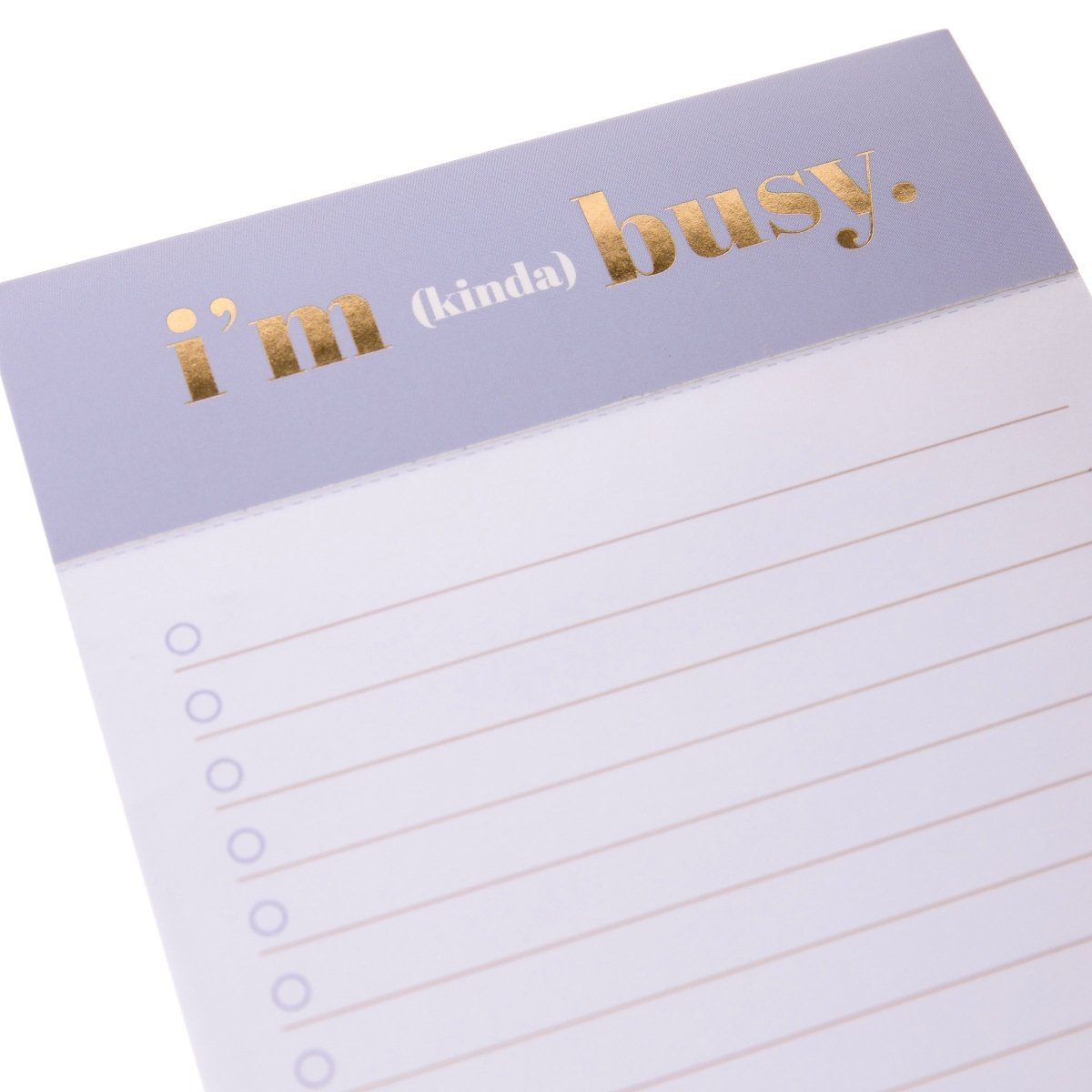 I'm Busy Jotter Notepad, A lavender-topped jotter notepad printed with 'i'm (kinda) busy' in gold foil above lined, checkbox-style pages.