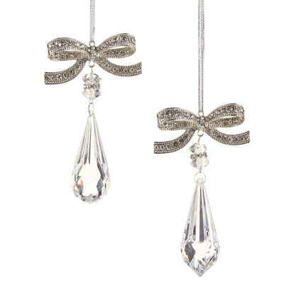 Jeweled Bow Ornament with Faceted Drop, Two ornaments on silver cords, each a rhinestone-set silver-tone bow above clear beads and a faceted clear drop, one rounded and one pointed.