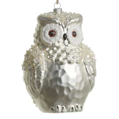 Jeweled Snowy Owl Ornament, A pearlescent white glass owl ornament with glittered eyes and clusters of pearl beading on its wings.