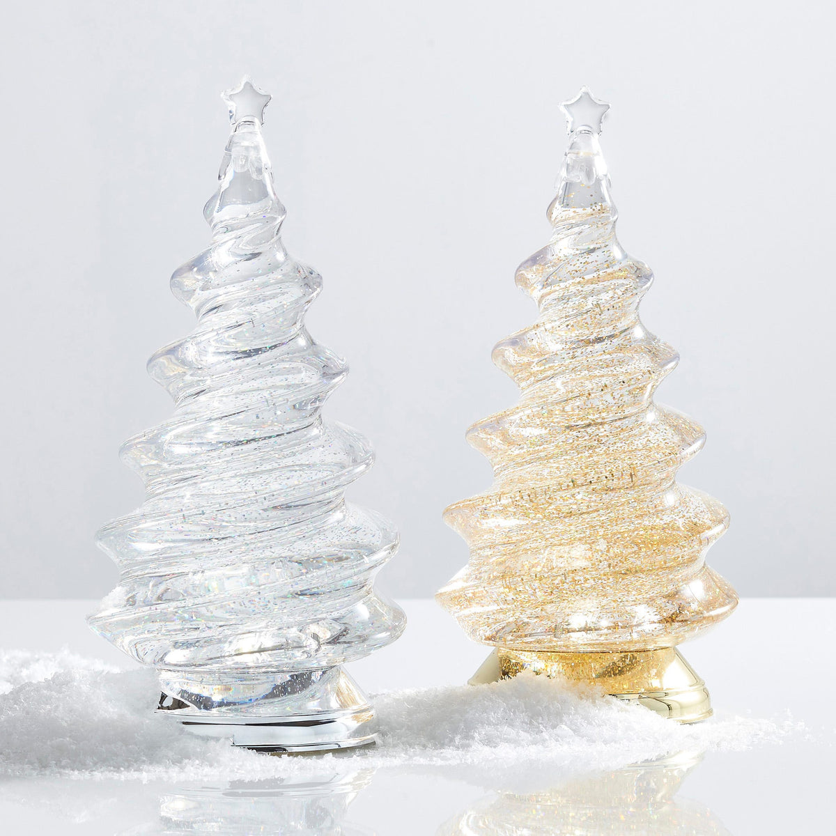 Lighted Gold Spiral Swirling Glitter Tree, A clear spiral Christmas tree filled with gold glitter, lit from inside, with a clear star on top and a shiny gold base.