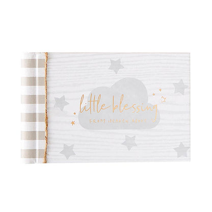 Little Blessings Baby Keepsake, The Little Blessings First Year Calendar cover is pale gray woodgrain with a gray cloud, gold script lettering, gray and gold stars and a round Baby's 1st Year Calendar seal.