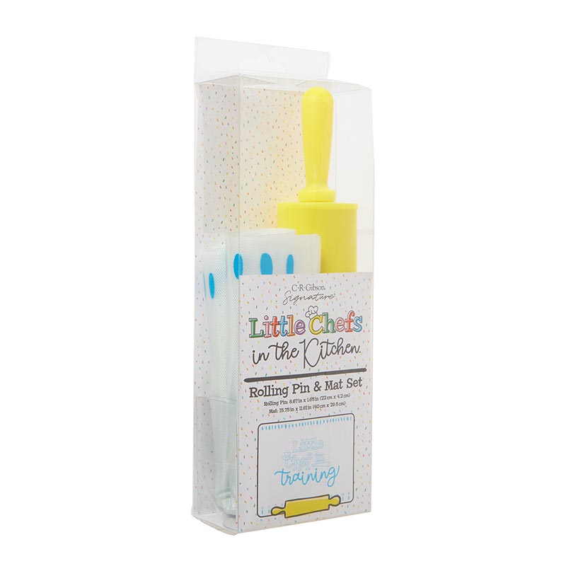 Little Chefs in the Kitchen Rolling Pin with Baking Mat, A clear gift box holding a yellow rolling pin and a folded baking mat, with a Little Chefs in the Kitchen label on a sprinkle-dot backing card.