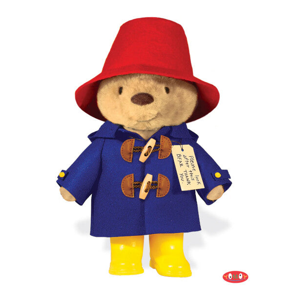Paddington Bear 10" Soft Toy with Boots, A plush Paddington Bear toy wearing a blue hooded coat, red felt hat, and yellow rain boots, with a tag reading "Please look after this bear."