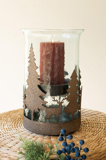 Metal Christmas Trees and Deer Cylinder Wrap, A cylindrical iron sleeve with cutout Christmas trees and deer, standing on three ball feet.