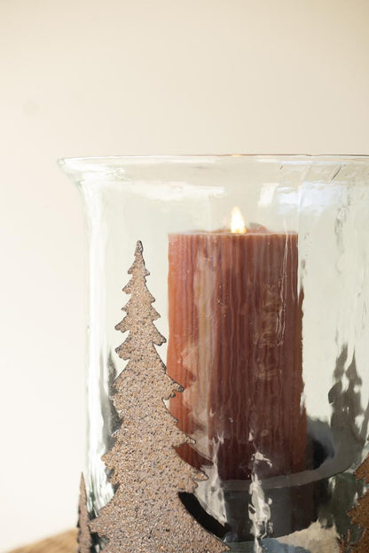 Metal Christmas Trees and Deer Cylinder Wrap, A cylindrical iron sleeve with cutout Christmas trees and deer, standing on three ball feet.