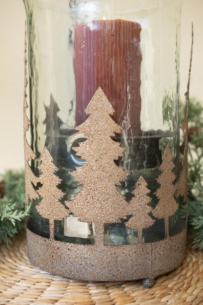 Metal Christmas Trees and Deer Cylinder Wrap, A cylindrical iron sleeve with cutout Christmas trees and deer, standing on three ball feet.