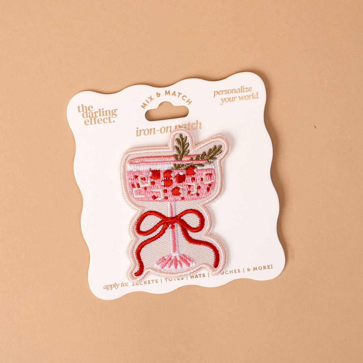 Mix & Match Iron-On Patch, A pink Be Kind patch on its patch card, with BE KIND spelled out in bold pink lettering.