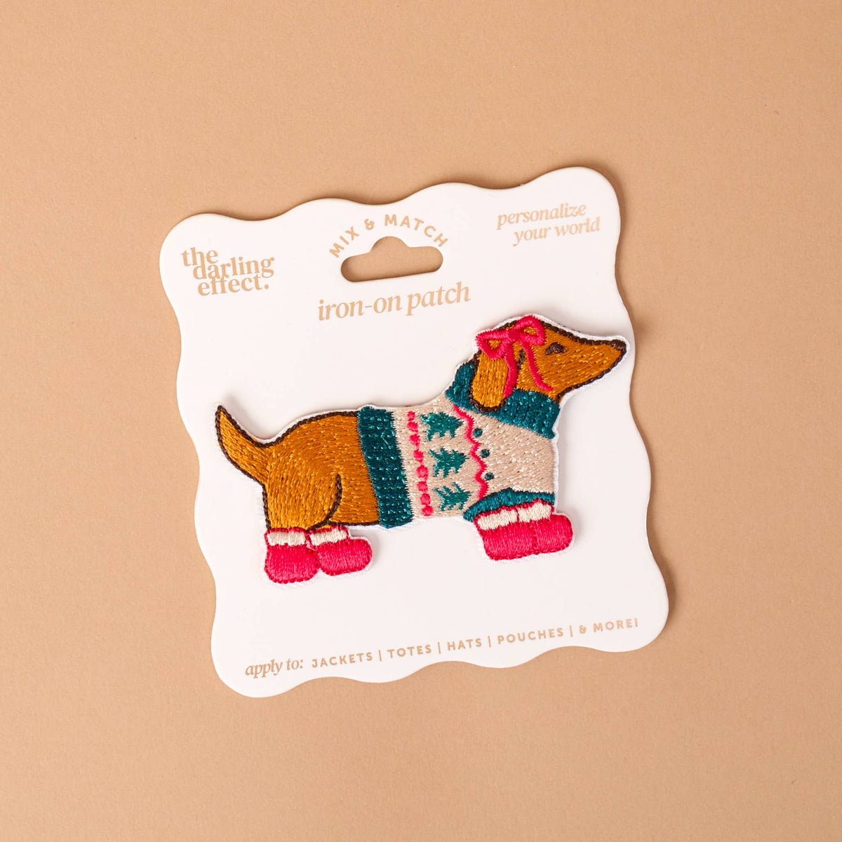 Mix & Match Iron-On Patch, A pink Be Kind patch on its patch card, with BE KIND spelled out in bold pink lettering.