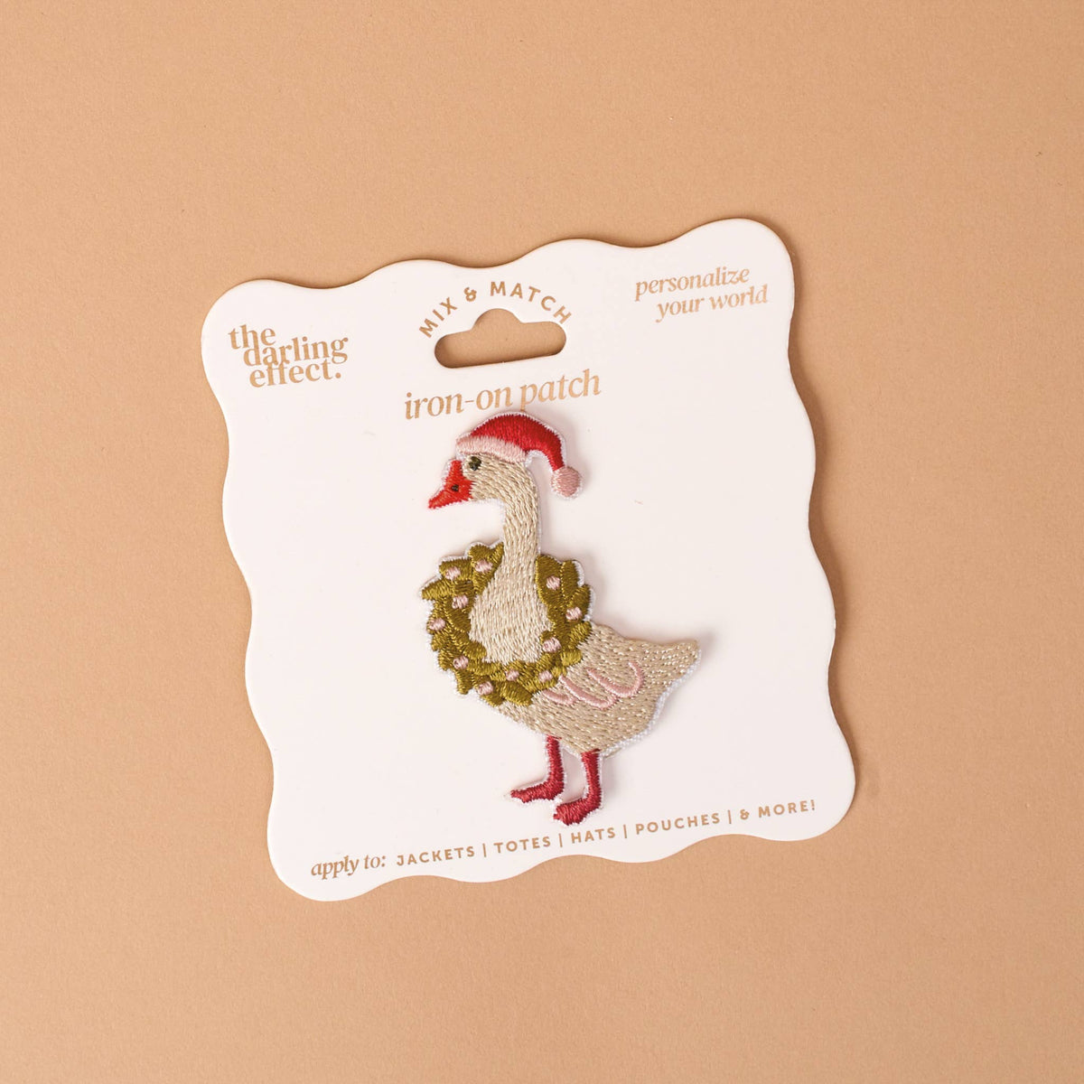 Mix & Match Iron-On Patch, A pink Be Kind patch on its patch card, with BE KIND spelled out in bold pink lettering.