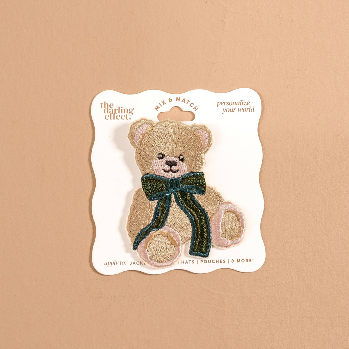 Mix & Match Iron-On Patch, A pink Be Kind patch on its patch card, with BE KIND spelled out in bold pink lettering.