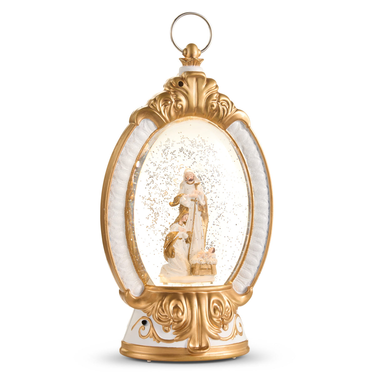 Musical Holy Family Lighted Water Lantern, An ornate gold and white oval lantern with a ring handle, showing Joseph, Mary and the infant in the manger in white and gold robes amid gold glitter.