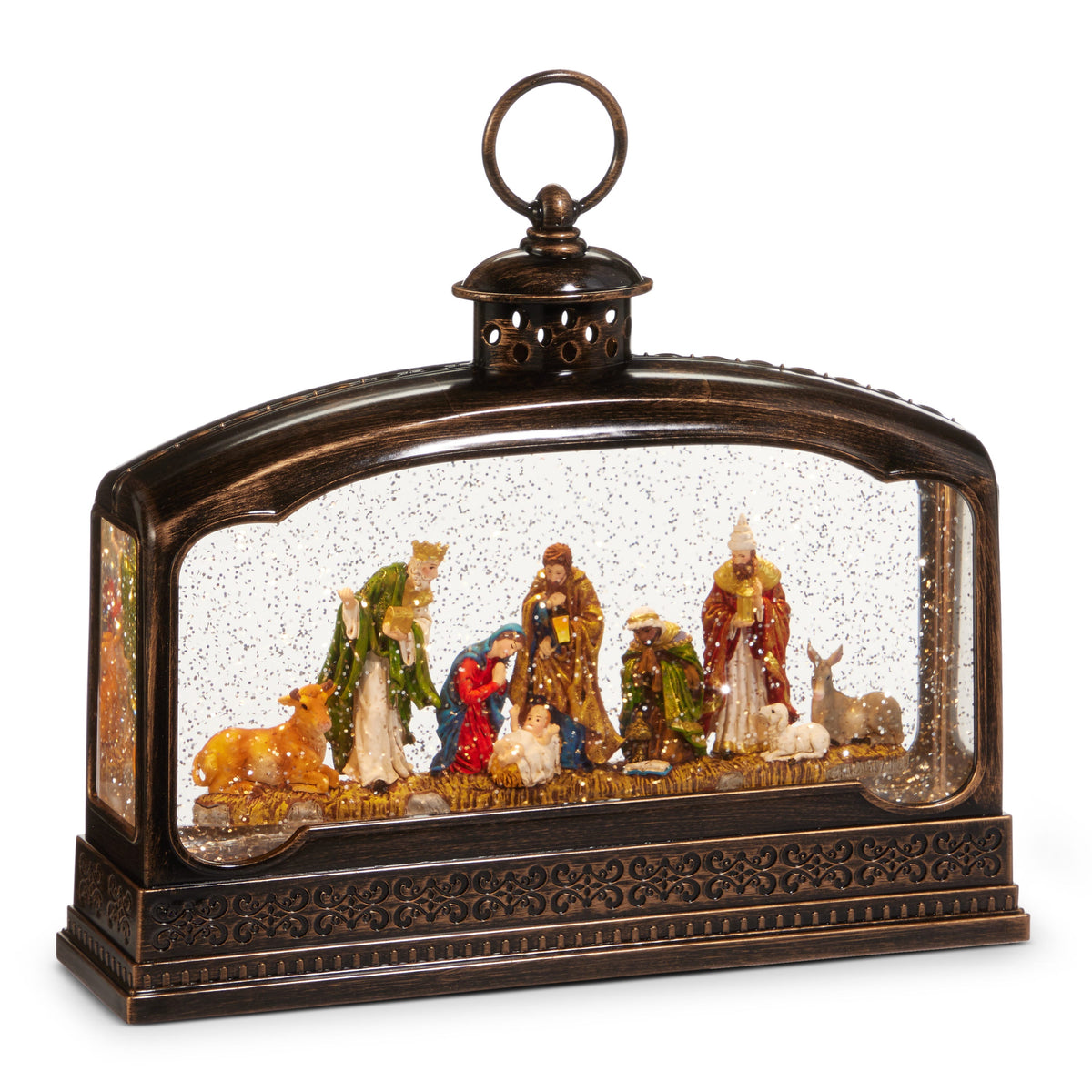 Nativity Lighted Water Terrarium, A wide bronze-finish lantern with a ring handle showing a nativity scene of Mary, Joseph, the infant in the manger, three kings, an ox, a donkey and a lamb amid swirling glitter.