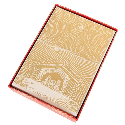 Gold Nativity Stable Holiday Cards, Box of 15, A box of cream Christmas cards printed with a gold foil nativity stable scene under a star.