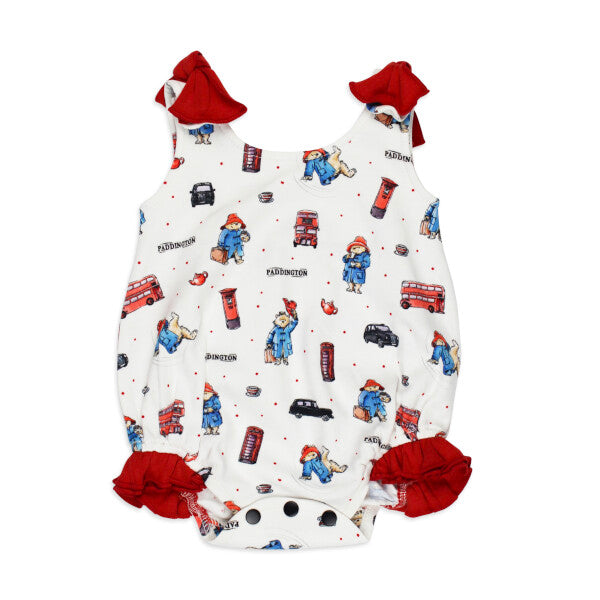 Organic Bowtie Shoulder Bodysuit, London Paddington Print, A sleeveless white baby bodysuit printed with Paddington Bear London scenes, featuring red bow tie shoulder straps and red ruffled leg trim.
