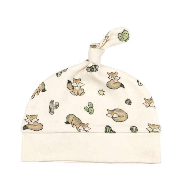 Organic Knotted Hat, Little Fox Print, A cream knotted baby hat printed with small foxes and cactus illustrations, with a matching solid cream brim.