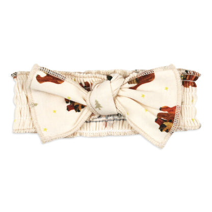 Organic Smocked Bow Headband, Brown Bear Print, A cream smocked baby headband with a front bow tie printed with a brown bear pattern and small yellow stars.
