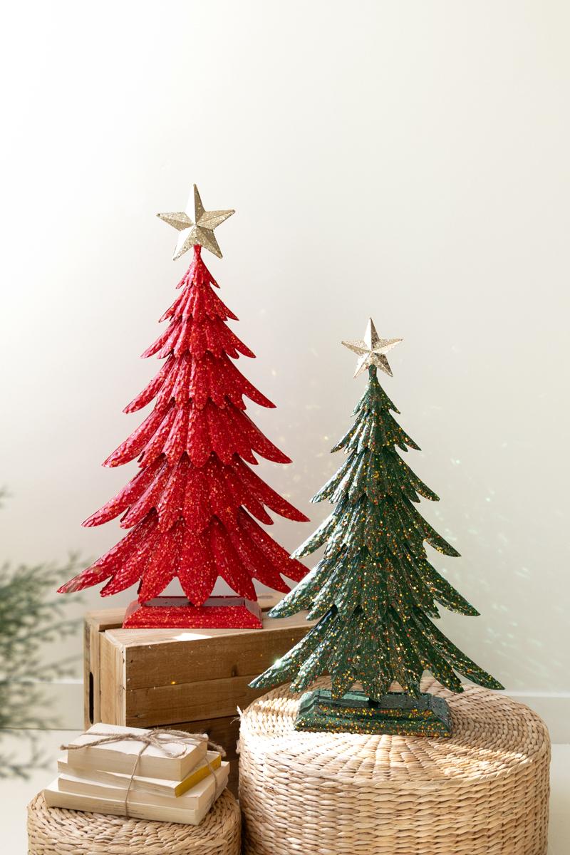 Painted Metal Christmas Tree with Glitter, Two painted metal Christmas trees with glitter finish and gold star toppers, one taller than the other.