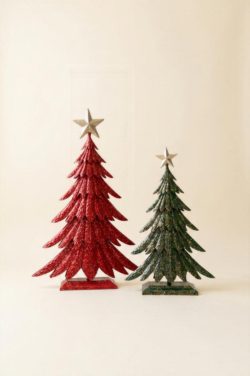 Painted Metal Christmas Tree with Glitter, Two painted metal Christmas trees with glitter finish and gold star toppers, one taller than the other.