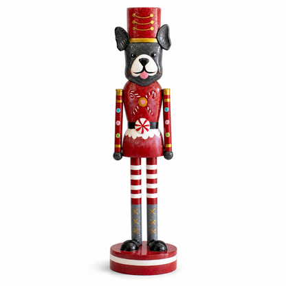 Painted Metal Dog Nutcracker, Black and White Dog design: a black dog with a white muzzle in a red coat painted with candy canes, a red hat, red and white striped legs, a red and white base