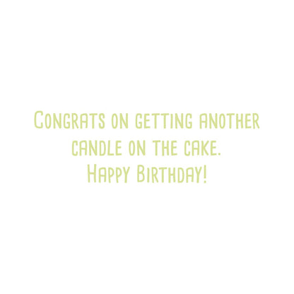 Party Hat Handmade Card, A white card with a die-cut party hat window filled with colorful confetti, silver holographic foil Happy Birthday text, and pom-pom tip-ons, shown with its envelope.