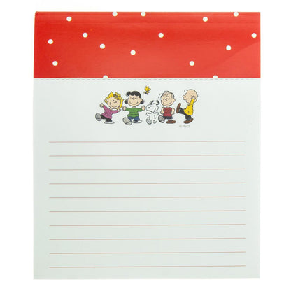 Peanuts Gang Jotter Notepad, A white jotter notepad with the Peanuts characters Charlie Brown, Snoopy, Linus, Lucy, Sally and Woodstock printed across the top of each sheet.