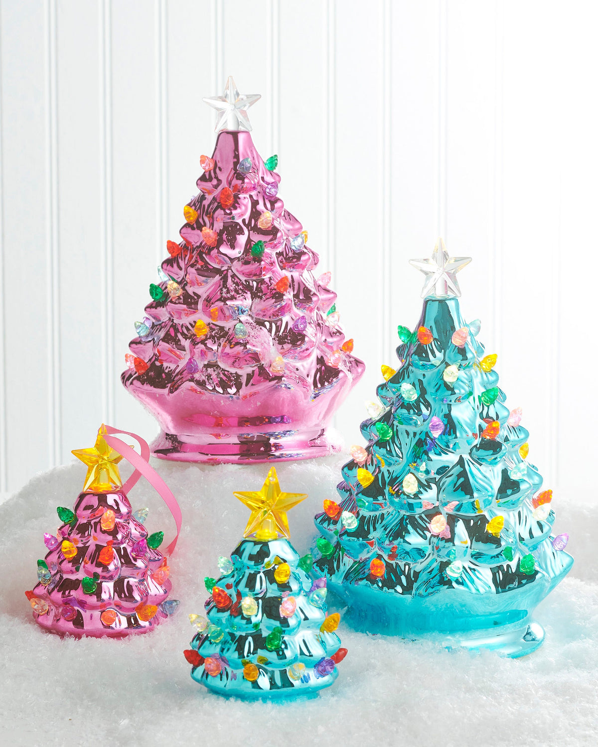 Metallic Blue Tree Lighted Ornament, A small teal blue metallic Christmas tree ornament with a gold star top and multicolor bead lights, hanging from a gold cord.