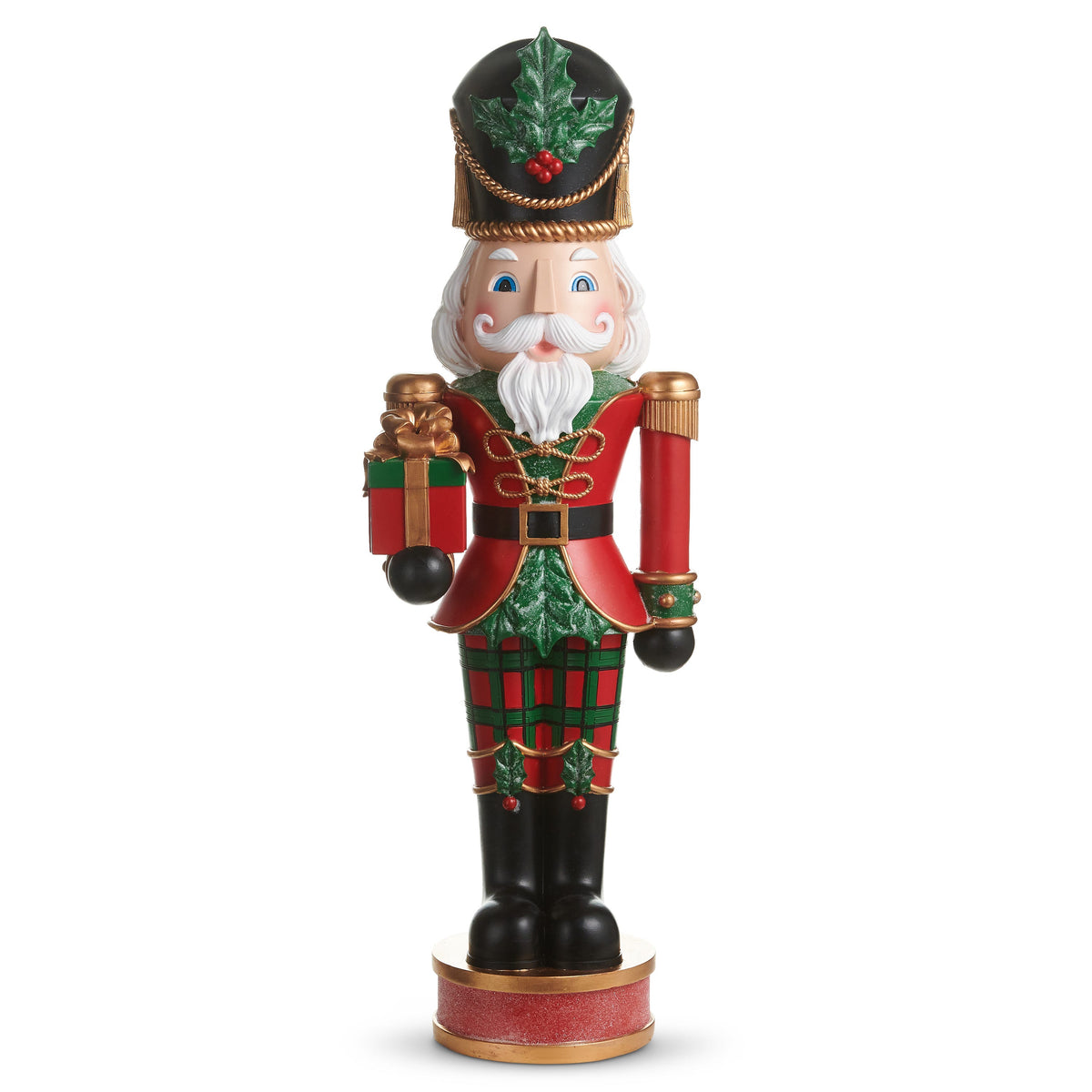 Plaid Nutcracker, A tall resin nutcracker soldier in red and green plaid, holding a wrapped gift and a baton.