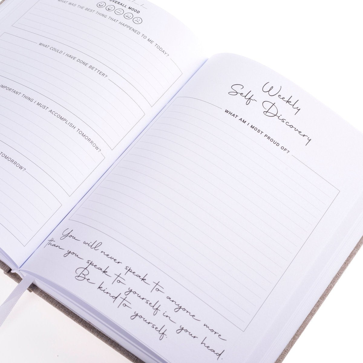 Positive Mind Self-Care Journal, A heathered gray fabric journal with 'positive mind' foiled in white above 'a journal for self-discovery and reflection'.