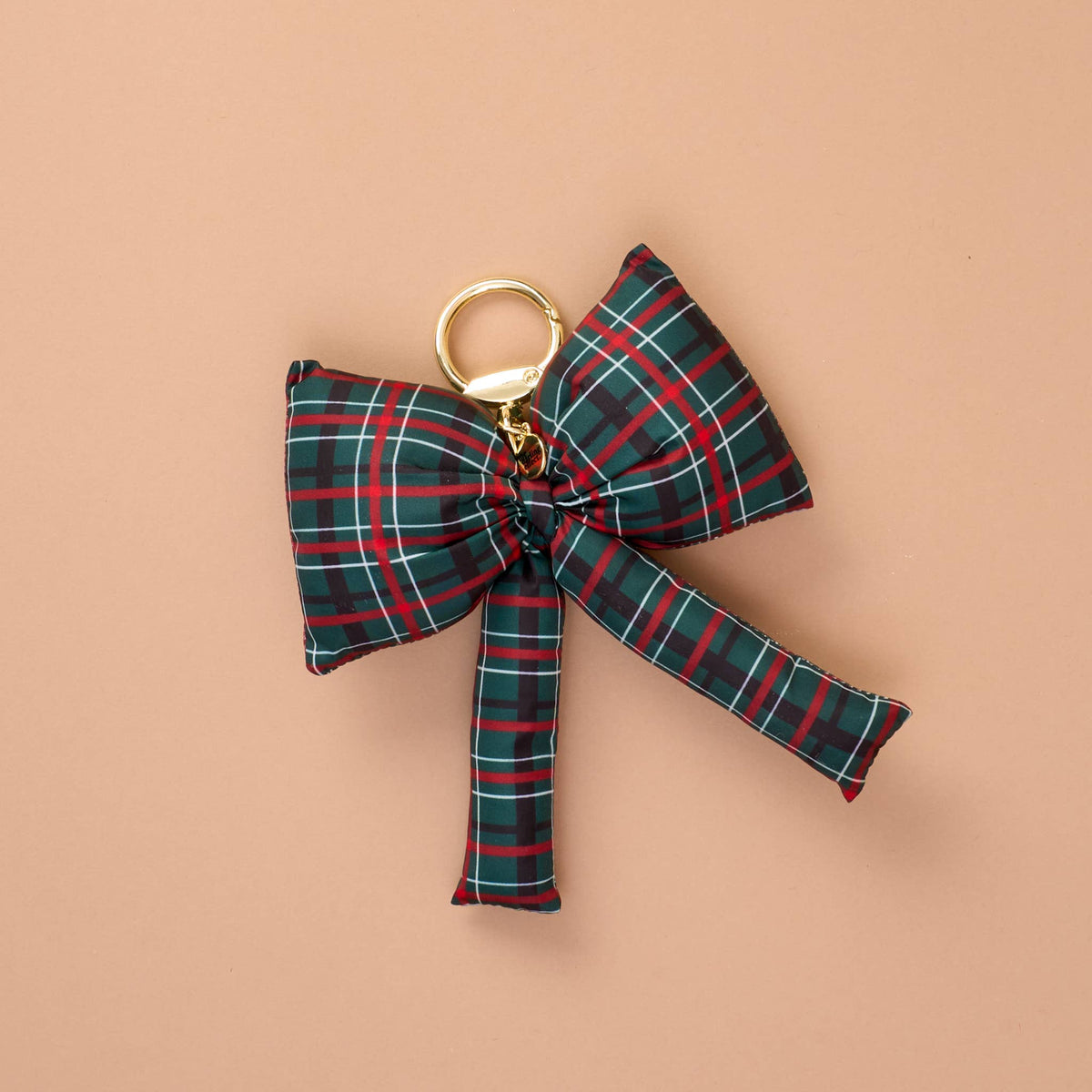 Puffy Bow Bag Charm, A green, red, and white plaid puffy bow shaped bag charm with a gold-toned keyring clasp.