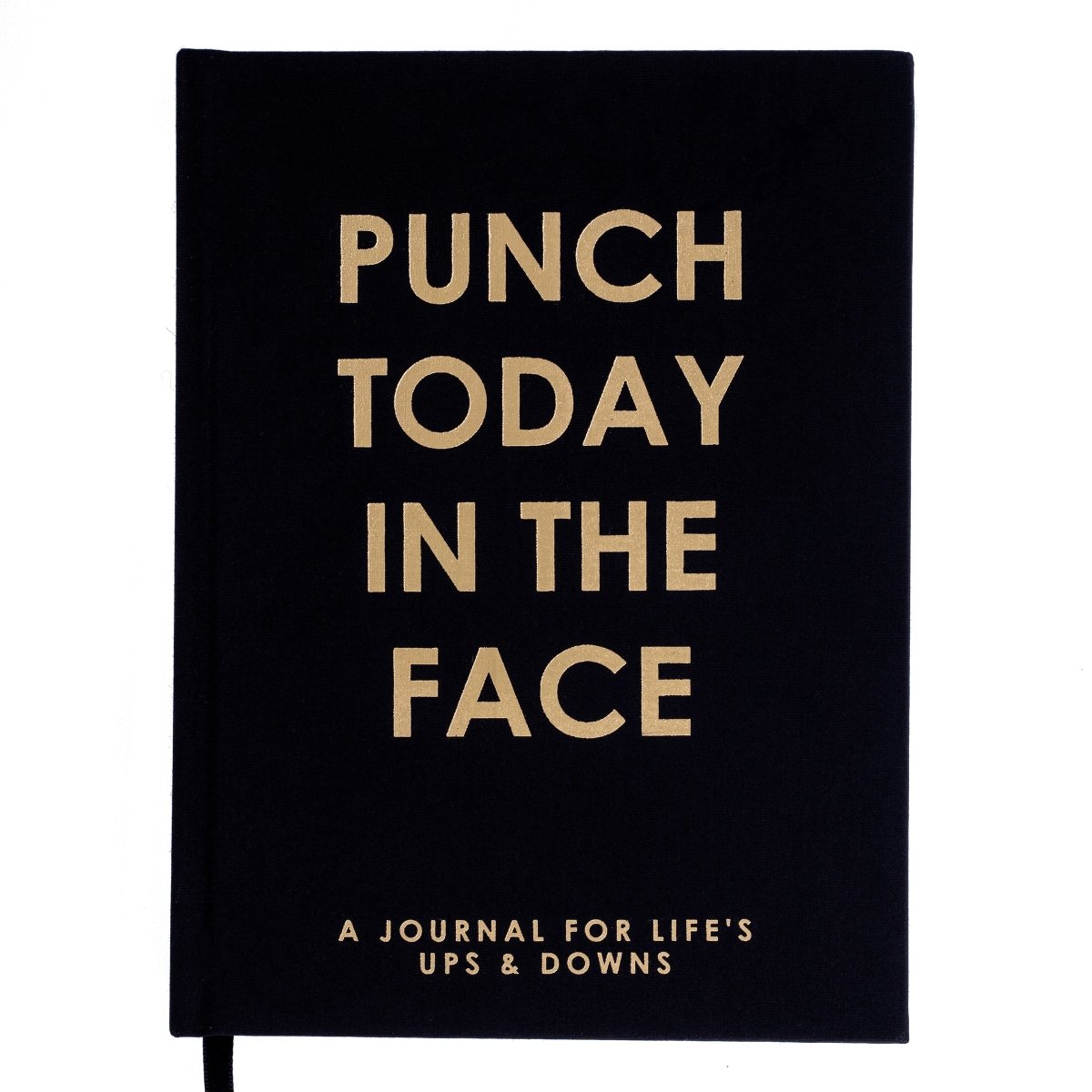 Punch Today Self-Care Journal, A black fabric journal with 'Punch Today In The Face' foiled in gold above 'a journal for life's ups and downs'.