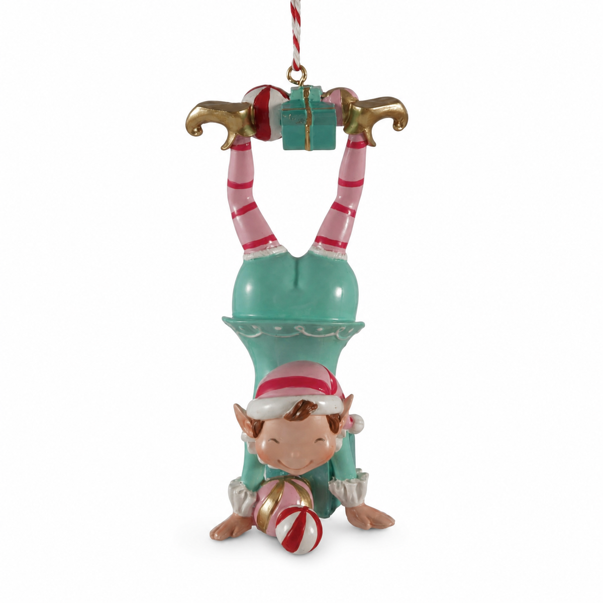 Resin Elf with Gifts Ornament, Handstand design: an elf tips upside down over a gift-filled box, mid-flip