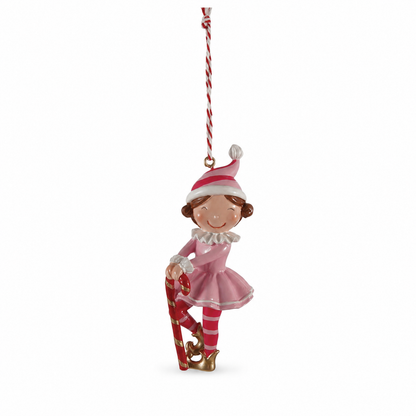 Resin Elf with Gifts Ornament, Candy Cane design: an elf poses in pink with a striped candy cane at its feet