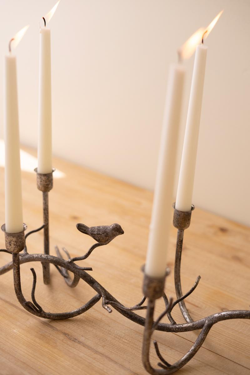 Rustic Metal Candelabra with Birds, A long curved iron candelabra with eight taper holders and two small bird figures.
