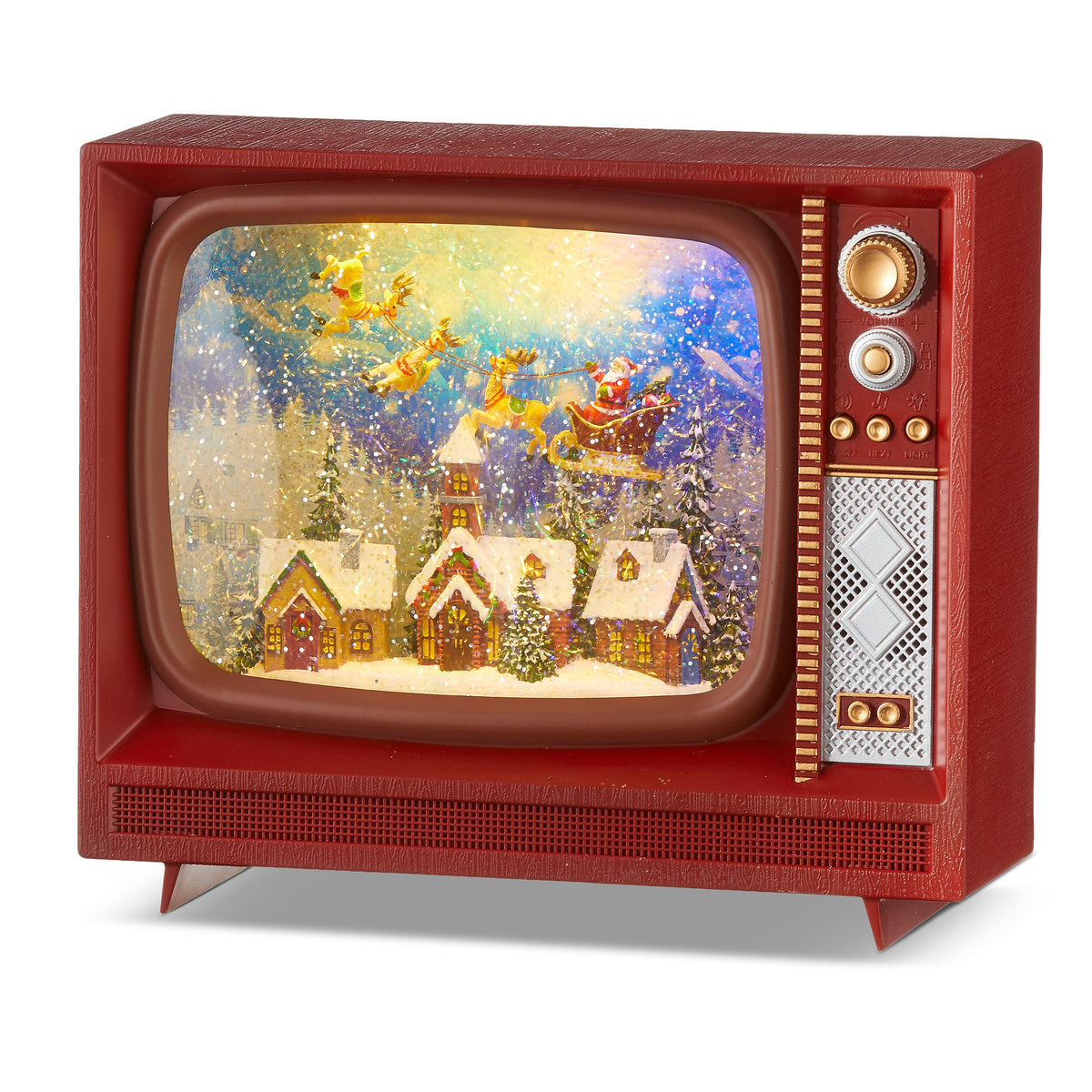 Santa Flying Over Town Musical Lighted Water TV, A red vintage-style television water globe whose lit screen shows Santa's sleigh and reindeer flying over a snowy village of houses and a church tower, with knobs and a speaker grille on the right.