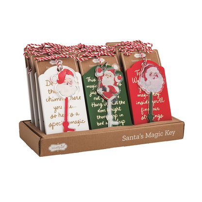 Santa's Magic Key with Sentiment Tag, Three Santa magic keys, each tied with red and white cord to a white, green or red sentiment tag on a kraft card.
