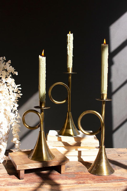 Antique Brass Trumpet Taper Candle Holder, Three antique brass taper candle holders shaped like trumpets in three heights.