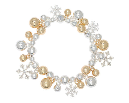 Pulsera de plata y oro con copos de nieve