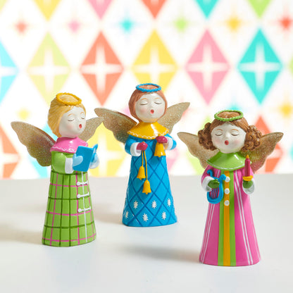 Singing Choir Angel Figurine with Glitter Wings, Three singing angel figurines with glittered gold wings and halos, one in a green plaid robe holding a songbook, one in a pink striped robe holding a lyre and a candle, and one in a blue snowflake robe holding bells.