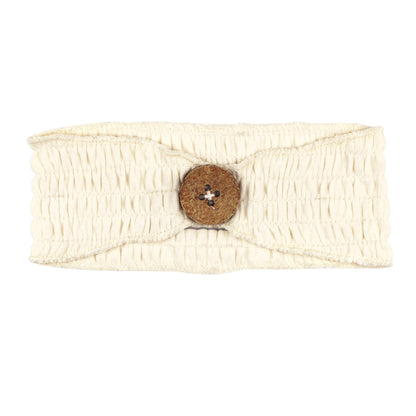 Smocked Button Headband, Buttercream, A cream colored smocked fabric headband with a round wooden button in the center.