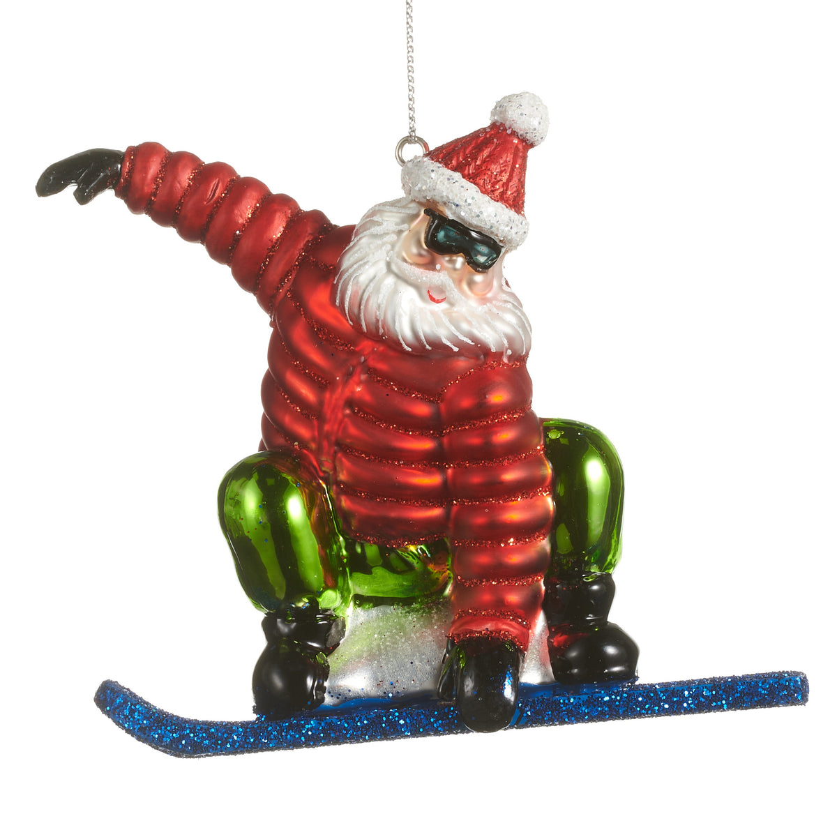 Snowboarding Santa Ornament, A glass Santa ornament wearing sunglasses, a red jacket, and green pants, riding a glittered blue snowboard.