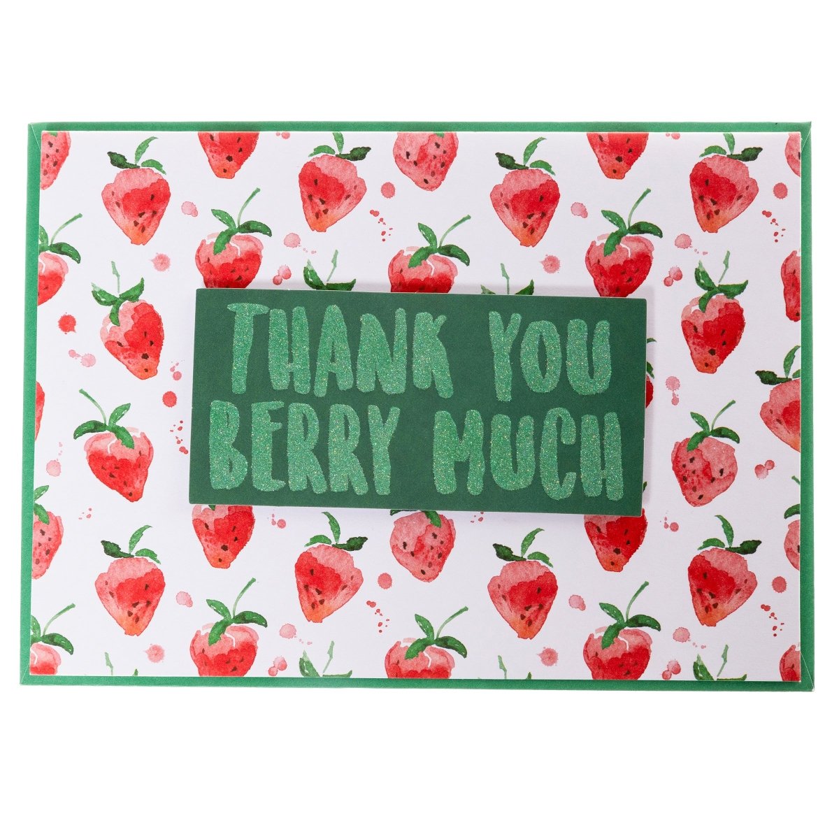 Thank You Berry Much Thank You Handmade Card, A white card patterned with watercolor strawberries and a green glitter tip-on banner reading Thank You Berry Much, shown with its envelope.