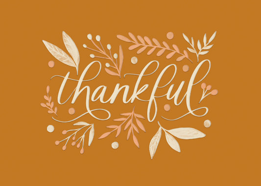 Thankful Reflection Greeting Card, A landscape card front in burnt orange with the word thankful in large cream script, surrounded by cream and peach leaves, berries and dots.