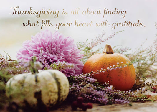 Thanks and Gratitude Greeting Card, Photograph of a pink flower, a small orange pumpkin and a striped gourd among tiny lilac blossoms, with a gold script message about gratitude across the top of the card.